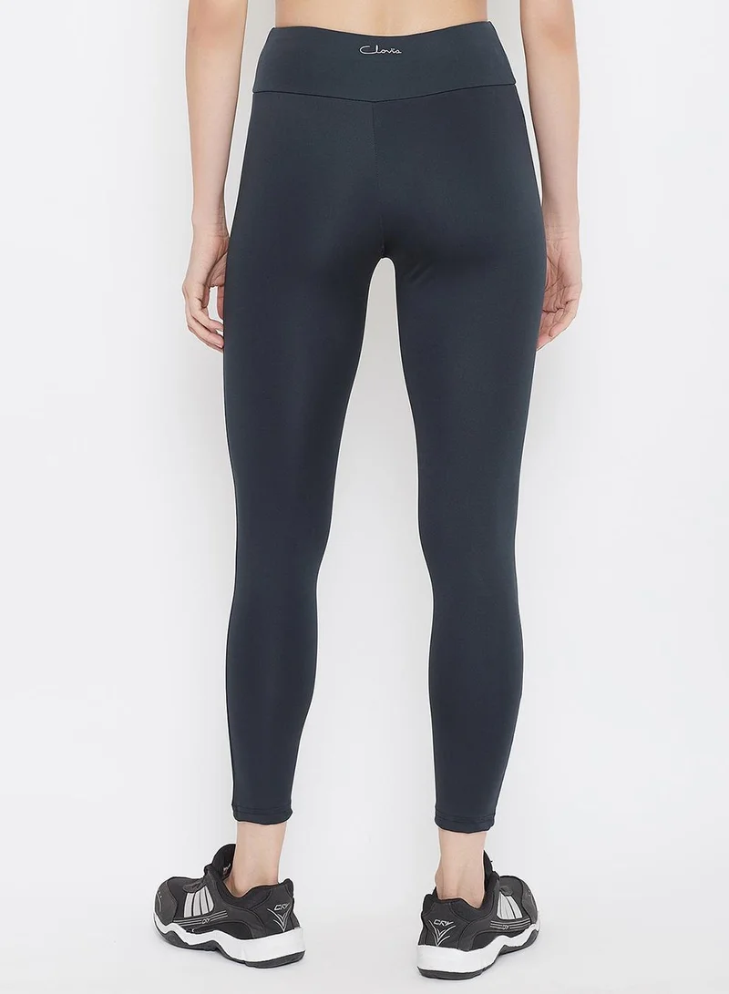Clovia Blue Snug Fit Active High-Rise Tights in Navy for Women | Best Price UAE